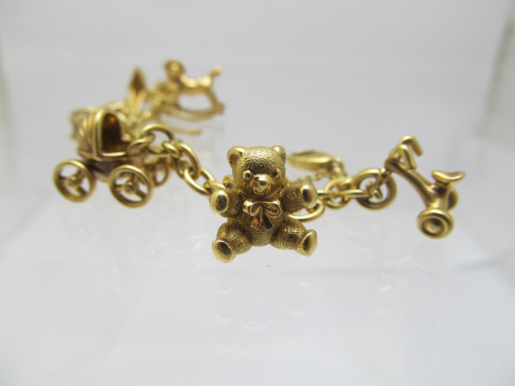 Cartier Gold Charm Bracelet In Excellent Condition In New York, NY
