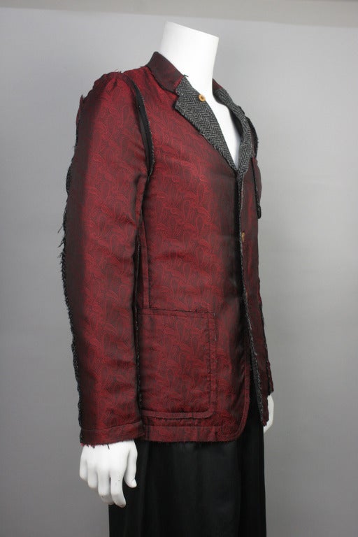 Comme des Garcons smoking jacket blazer in a fine paisley brocade and lined and patched with herringbone tweed.