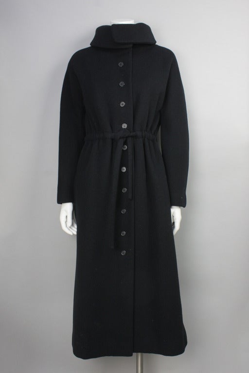 40% OFF! Originally $495

Winter coat with dramatic high collar and drawstring for a defined waist.