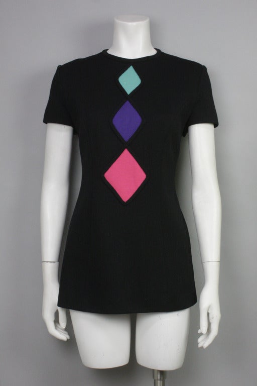 Originally $450

Black short sleeve tunic top with pastel rhombus decoration and matching jacket. 
Please see last images for measurements.