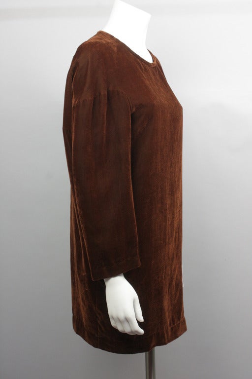 10% OFF! Originally $395

Chocolate brown velvet dress with unique structural details. 3/4 length sleeves set below the shoulder. Fully lined. Can be worn as a minidress or a tunic over leggings or a skinny pant.