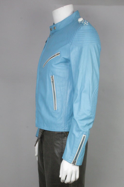 Amazing leather jacket by Margiela in an offbeat sky blue color. Braided detail at shoulders. Classic motorcycle jacket shape. Quilted lining. From the S/S 2007 collection.