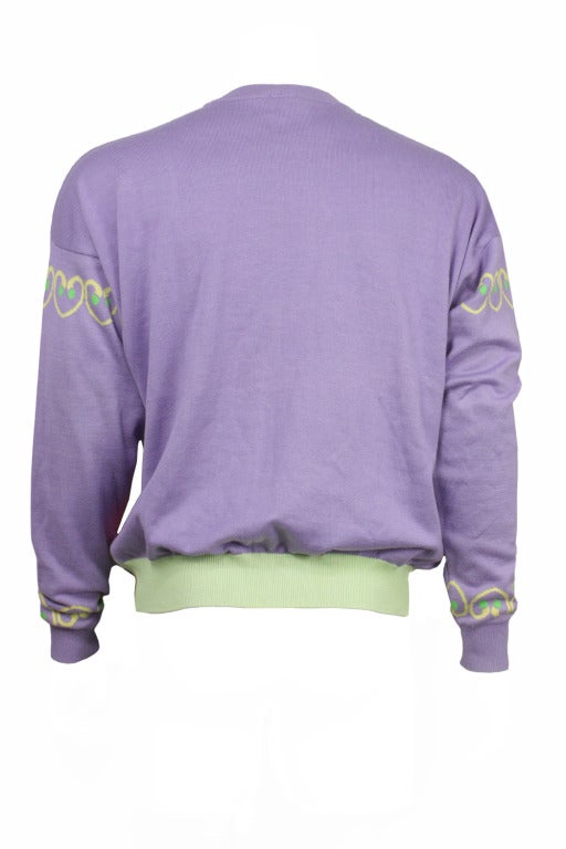 Soft cotton sweater in lavender with knit in design featuring Miami Beach's famous Cameo nightclub.