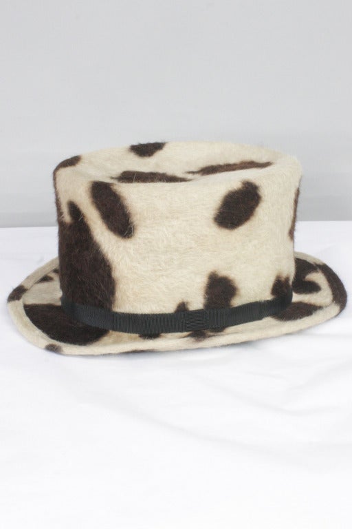 SALE!! Originally $600
Patrick McDonald believes in the art of dressing.  For fashion's favorite dandy, every ensemble begins with a designer hat bold enough to stand alone. This hat is part of Patrick's personal collection for sale only at