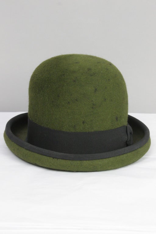Patrick McDonald believes in the art of dressing.  For fashion's favorite dandy, every ensemble begins with a designer hat bold enough to stand alone. This hat is part of Patrick's personal collection for sale only at Screaming Mimis through