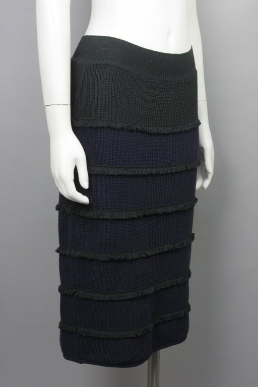 50% OFF! Originally $399

Deep green and navy knit cotton skirt with fun fringe stripe accents. Loop at the back waistband.