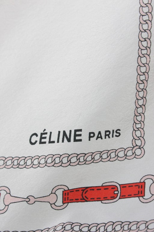 10% OFF! Originally $225

White Celine scarf with red horse bit print border.