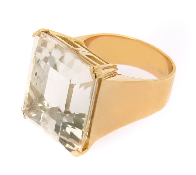 This is a fabulous ring that looks great on the finger. The stone is faceted and the mounting is very complimentary. The ring is a size 8 and the stone measures 7/8