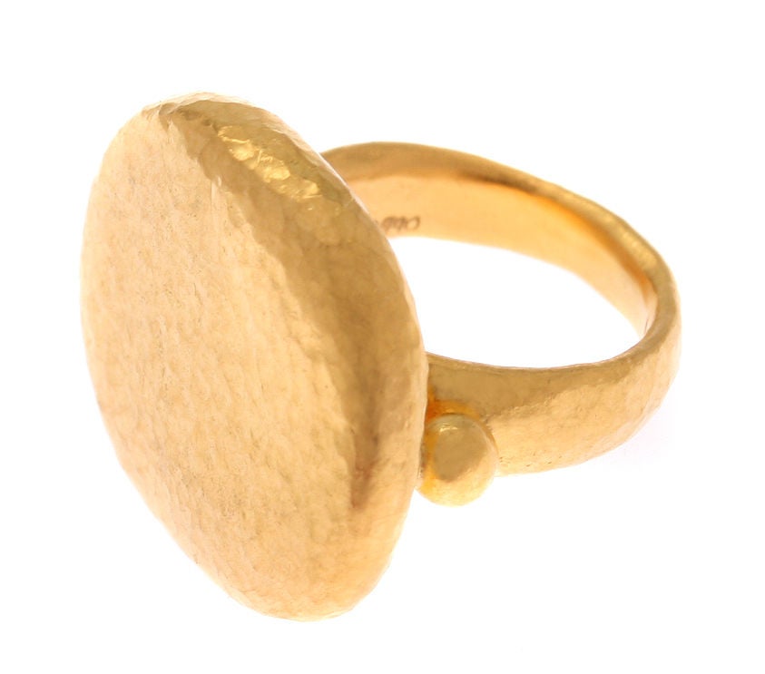 This is a wonderful ring in that gorgeous 24kt gold color. It is very simple and sculptural.<br />
*Measurements*<br />
The face of this ring measures 7/8