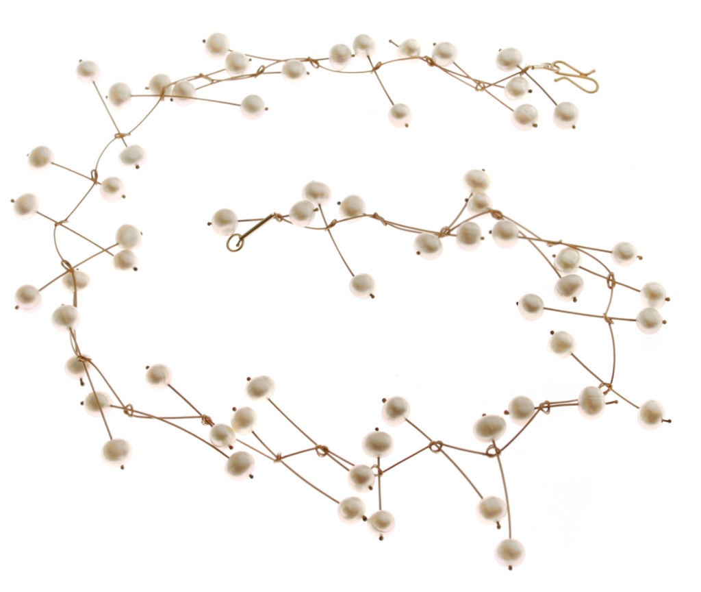 This is a beautiful necklace with a floating pearl motif.<br />
*Measurements*<br />
Approximately 17 1/2