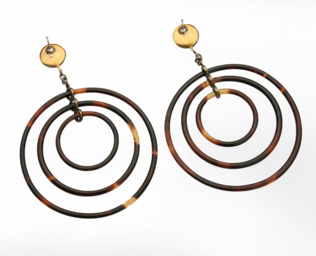 These are wonderful earrings.  They have a very Modernist look.