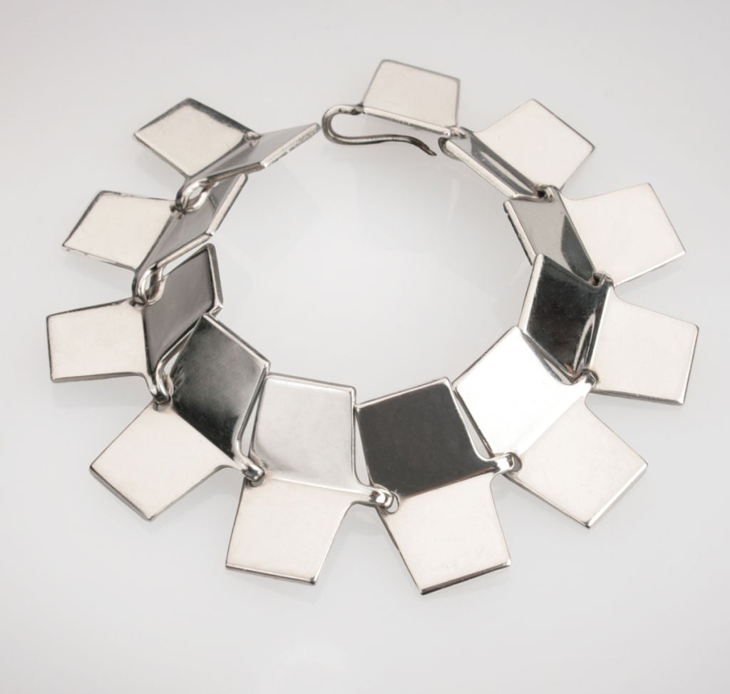 This is a fabulous modernist sterling silver bracelet by Hans Hansen.