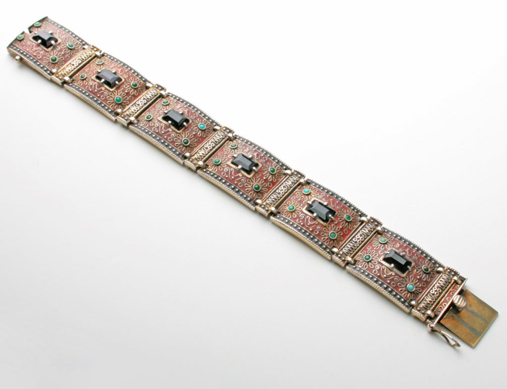This is a very nice example of Theodor Fahrner's earlier work. The bracelet is marked 