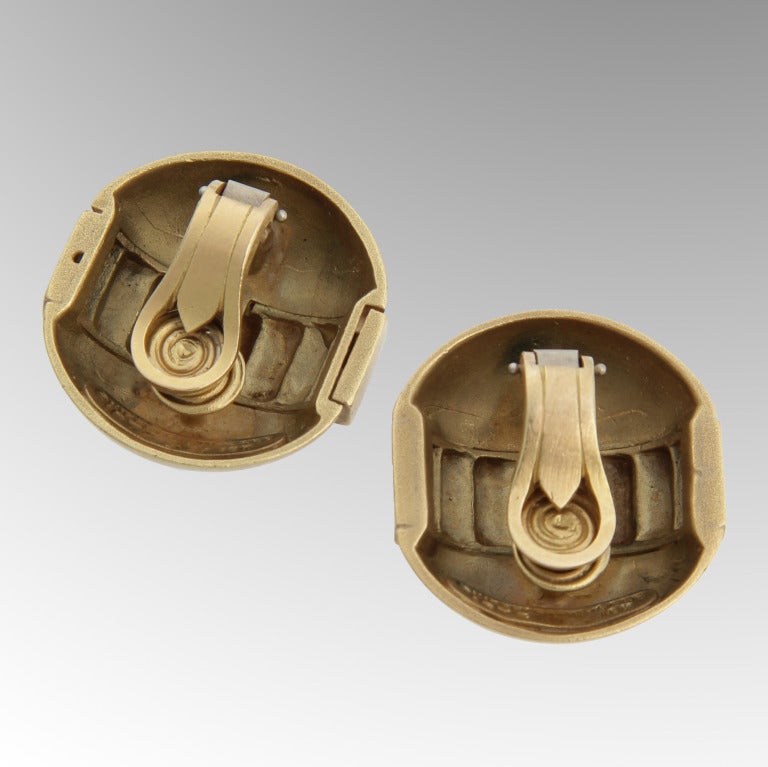 These are interesting clip on earrings  with a cubist motif in a satin gold finish.
They could be easily be converted to pierced