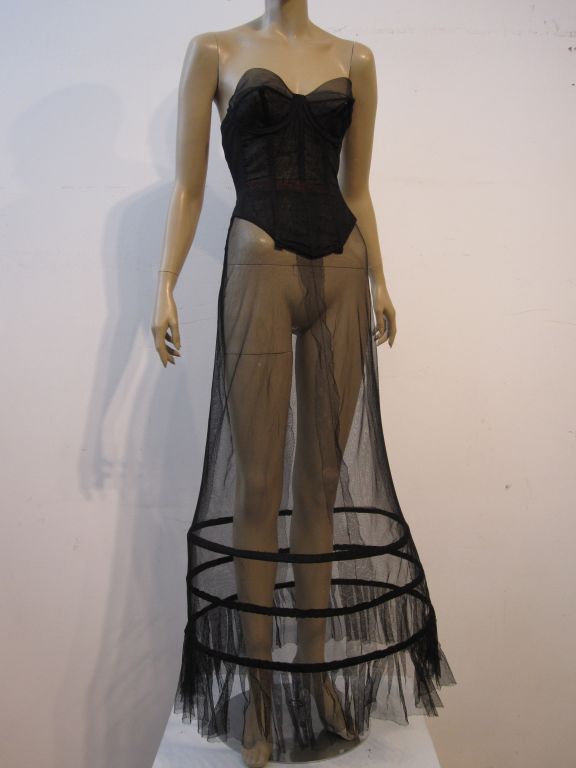 Fabulous iconic Warner's 50s Cinch-Bra Merry Widow foundation garment in size 34-35B.  Garters not included, though there are tabs for them to attach.  Also pictured with full length couture black tulle hoop skirt undergarment.
