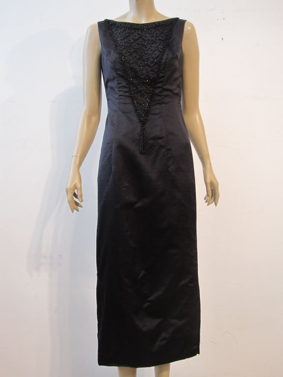A great MadMan style 60s silk satin beaded column dress, sleeveless with bateau neck