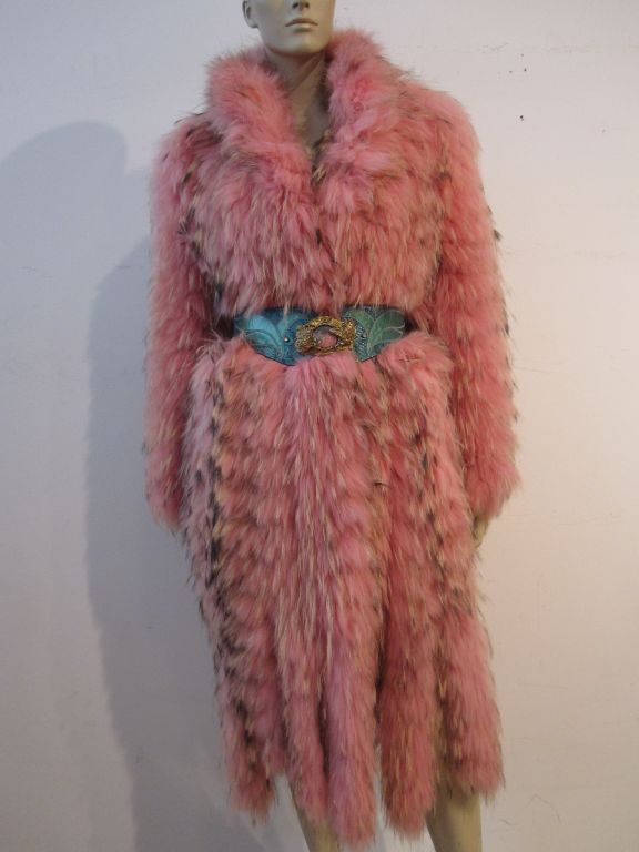An incredible Escada coat--barely worn--from the 2008 collection in Mint condition.  It is intricately pieced together with pink and tan fox fur and edged with 