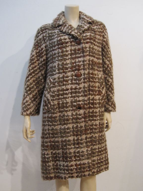 A great little Lilli Ann 50s brown and tan wool tweed car coat with rust color taffeta lining and leather buttons.