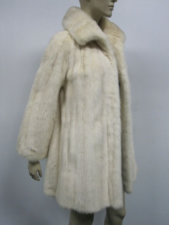 50s Ivory white mink swing coat with bracelet length sleeves.