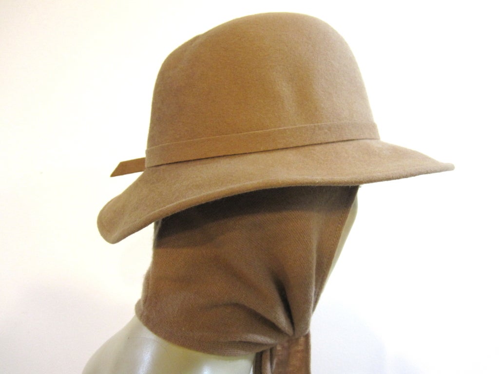 brimmed hat with attached scarf