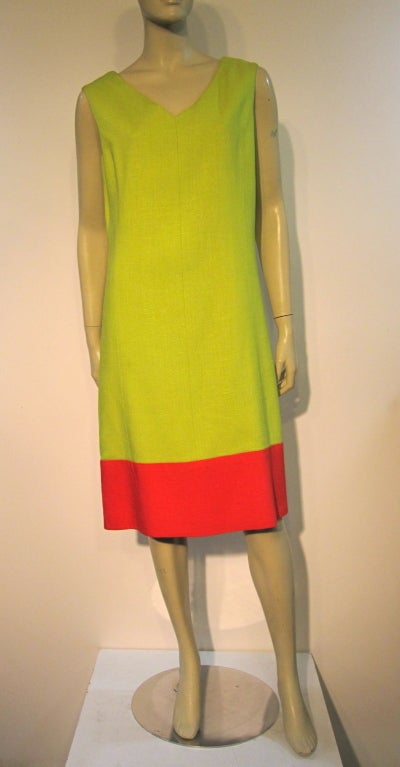 A wonderfully simple and well-made 60s linen color-blocked shift in lime green and vivid coral by Teal Traina.  Fully lined.  Size 6-8