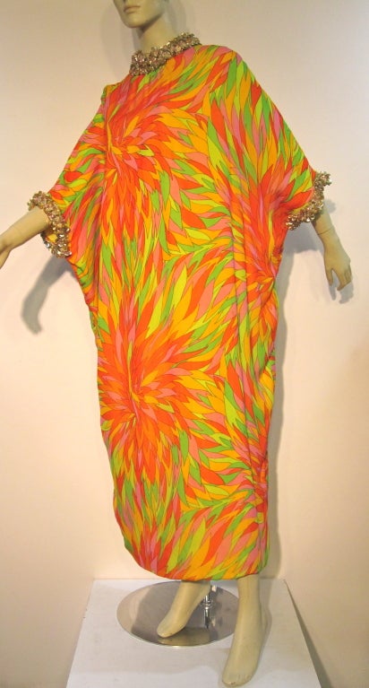 A fabulous 60s Pucci-esque Eva Haynal silk caftan in lime green, yellow, orange, pink and orange sunburst print 3/4 