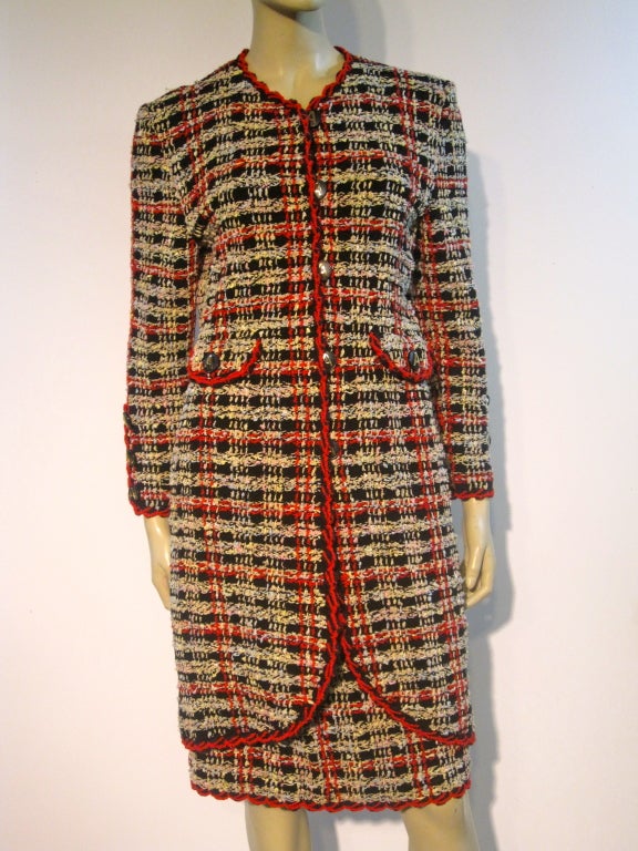 70s Adolfo walking suit style bouclé knit suit in a longer jacket style. Approx. size 8. With 