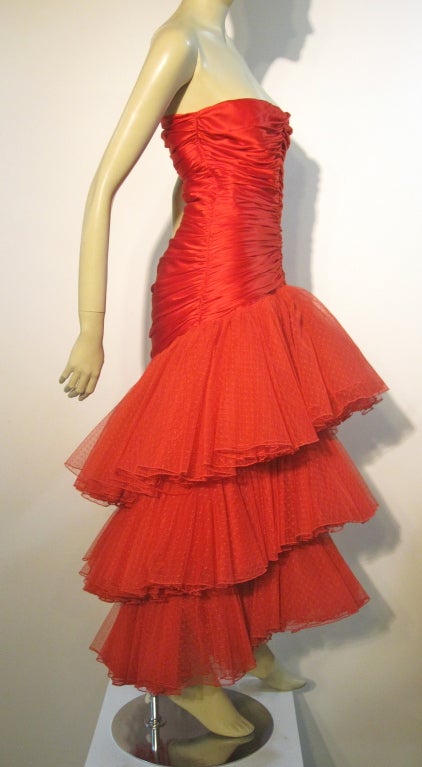 A fabulous 80s fire engine red Alfred Bosand silk charmeuse and silk tulle gown, boned and strapless in size 8 with three extravagant layers of tulle and Swiss dot ruffles!
