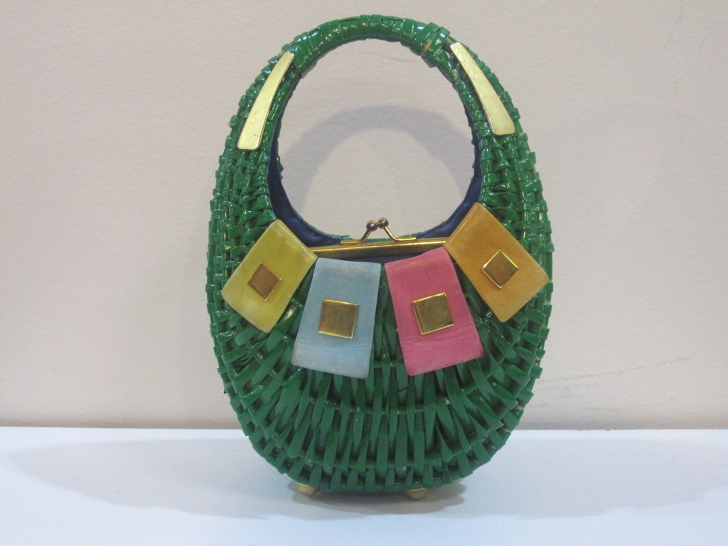 A fabulous Easter basket handbag, this Koret stunningly mod spring kelly green egg shaped wicker basket has a snap-closure purse inside, brass feet and leather and gold-tone metal ornamentation!