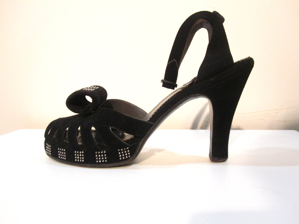 Fantastic 40s black suede ankle strap platforms from Cangemi - Autographed Edition.  Buckle ornaments and platform are studded all around.  Size 6.5AA.  Excellent condition-- missing a few small studs.