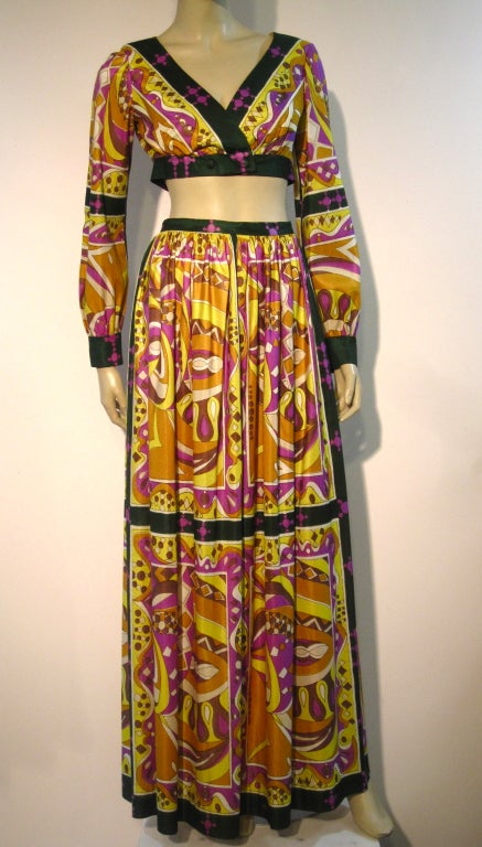 A sexy 60s mod print 2-piece Saks Fifth Avenue ensemble with psychedelic print maxi skirt and long-sleeved V-neck, midriff-baring top.  

So chic! Size 2-4.