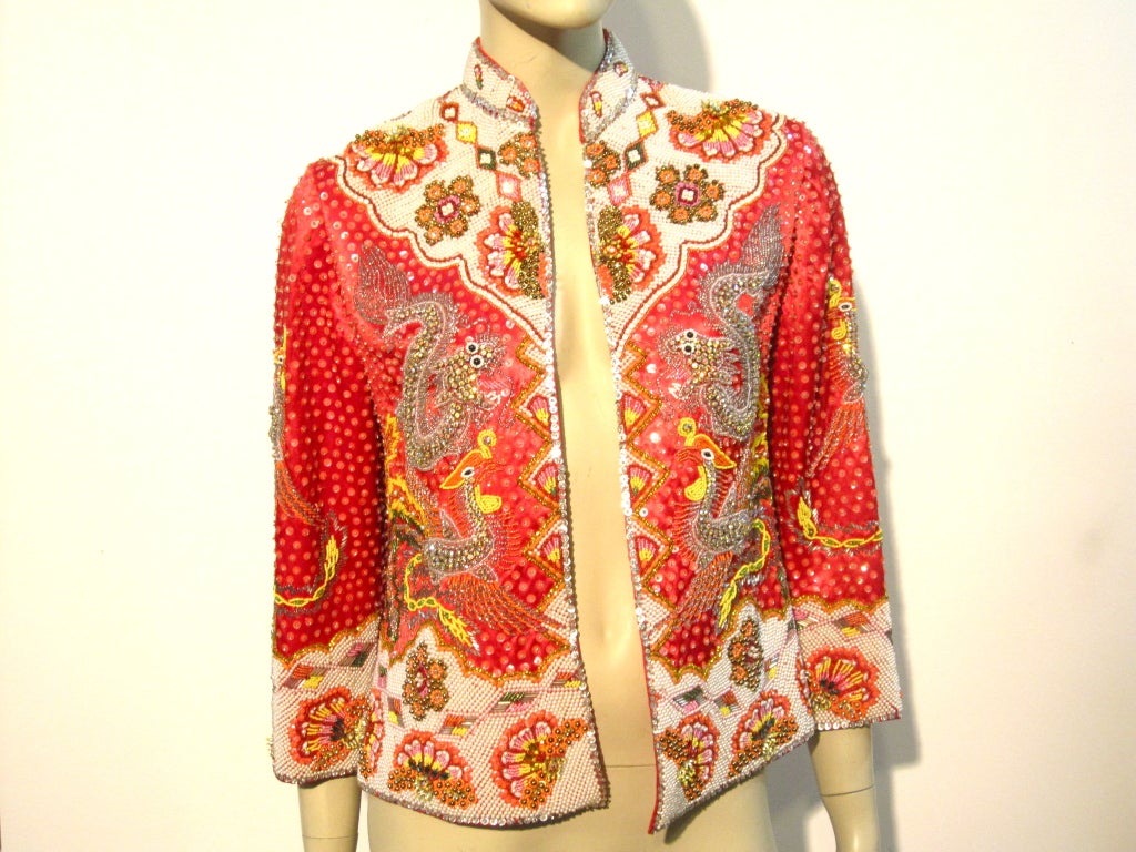 A fabulous 60s Eva Haynal completely beaded bracelet length sleeved jacket originally sold at Saks Fifth Avenue.  Size 4-6