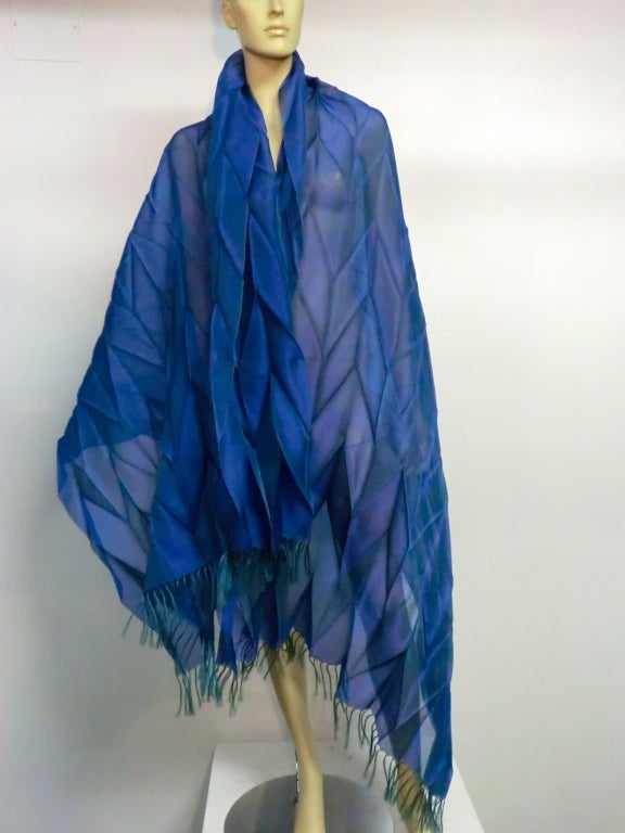 A gorgeous two tone blue and teal Issey Miyake large fringed and pleated wrap.