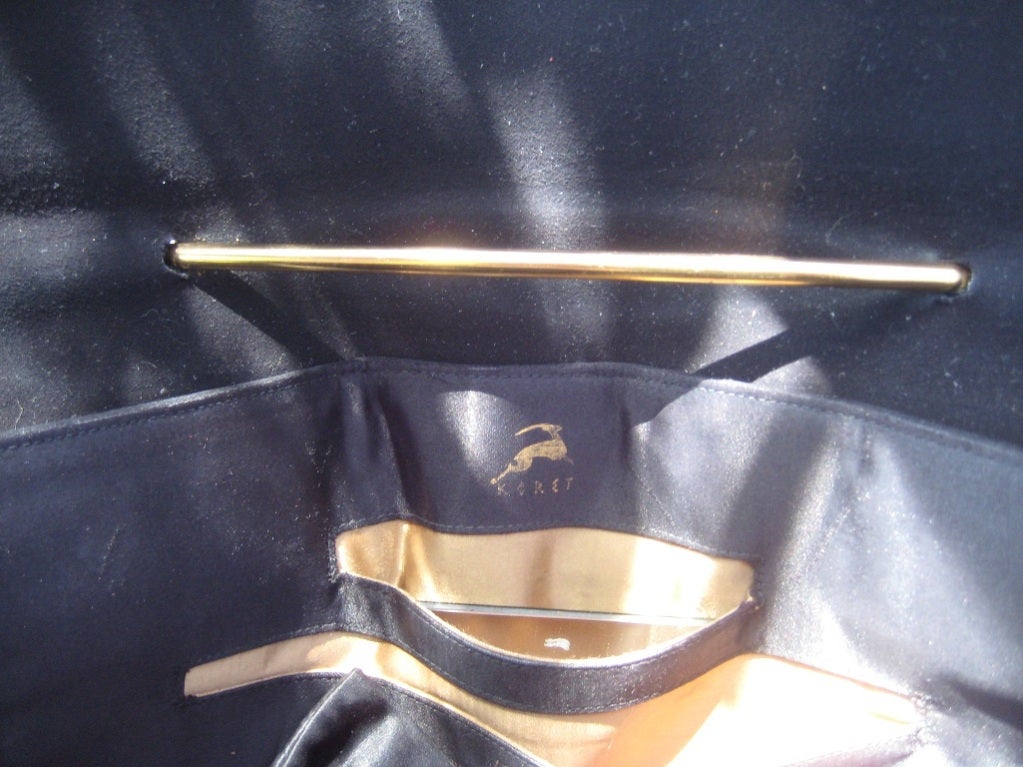 handbag with safety pin handle
