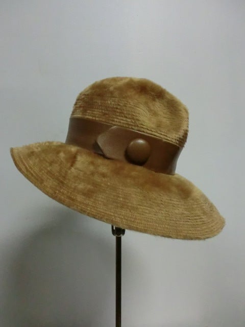 A gorgeous caramel color mohair Christian Dior fedora with leather band and button.  Gorgeous.  Medium size.