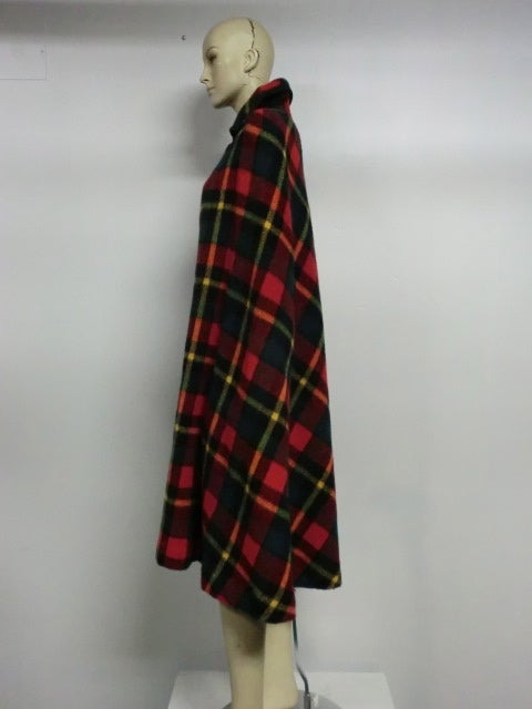 70s Joseph Magnin tartan plaid mohair cape: calf length with collar and front edged in braid trim and a metal clasp at neck.  Unlined. Size 4-6