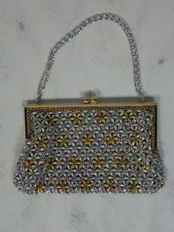 A great little 60s all metal, mesh handbag in gold and silver!