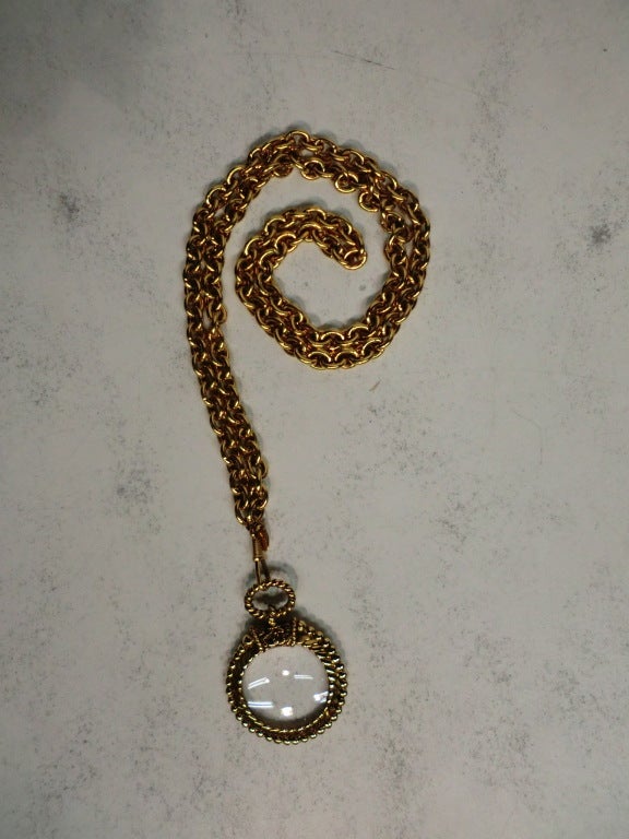 A fantastic Chanel 80s monocle magnifying glass pendant necklace.  Marked and in excellent condition. Chain measures 36