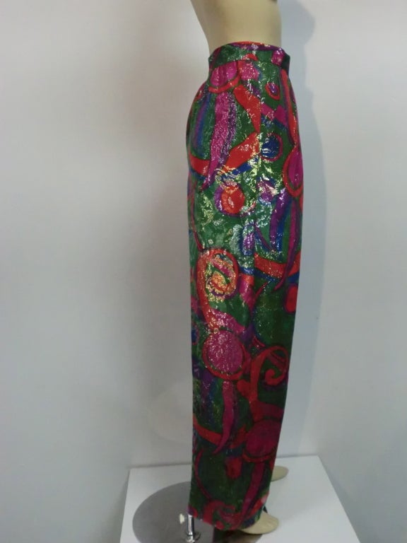 Yves Saint Laurent 80s multi-color silk lame brocade pleated pant with side pockets, full leg  and button waist band.  Waist size 31. (at true waist)