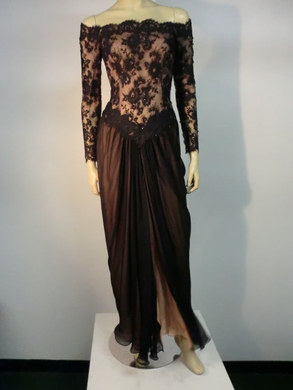 A beautiful Michael Casey off the shoulder sarong style gown in black and beige silk chiffon and lace.  Fully lined.