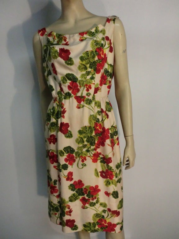 A beautiful 50s lightweight washed silk floral print wiggle dress with notched neckline and back cowl.  Size 6-8