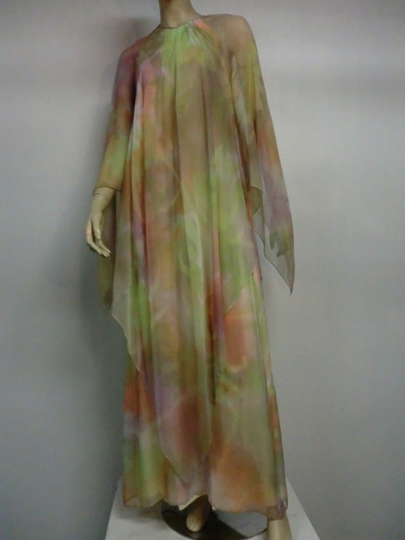 A gorgeous, flowing 60s chiffon gown in painted pastel-toned watercolor. Angel sleeves. Beautiful!