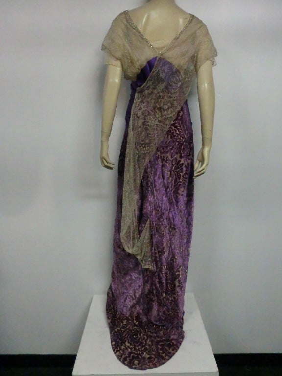 A gorgeous Art Nouveau gown in silk  and metallic lace, lavender burn-out velvet, small train, royal purple silk satin bandeau waist with a silk flower at the center bodice.