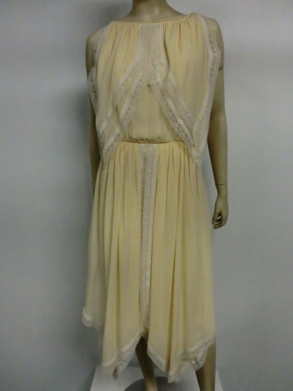 A gorgeous pale cream silk chiffon and lace trimmed 70s Bill Blass 