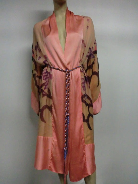 A gorgeous 1920s hand-painted Art Deco style silk chiffon and satin reversible robe.  Comes with cord belt included (not original)