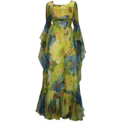 60er Jahre Chiffonkleid mit Blumendruck und dramatischen Ärmeln
