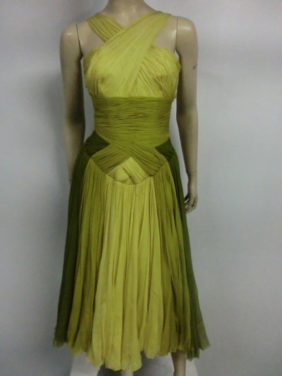 A stunning 50s silk chiffon party dress by Nanty in three shades of olive and chartreuse!  Criss-cross bodice is elaborately ruched and gathered.  Fully lined, boned and GORGEOUS!