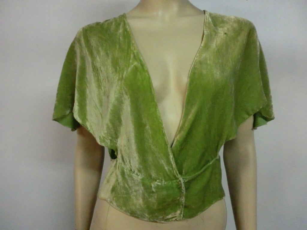 A gorgeous little 1920's Art Deco pistachio silk velvet evening jacket/overlay.  Wrap-around.  Deep V neckline.  Open underarms.