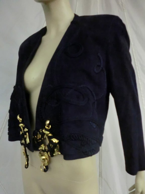 A fine, never worn with tags, black suede Gianfranco Ferre 1980's cropped jacket with structured shoulders braid embellishment and gold-tone metal front details.