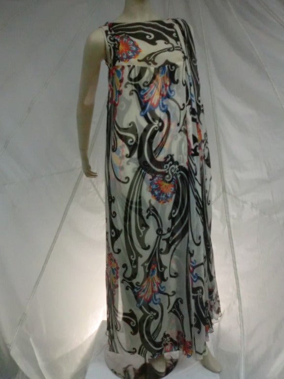 A fantastic 1960's Bergdorf Goodman column dress with chiffon overlay.  Both layers are printed in a fantastic 